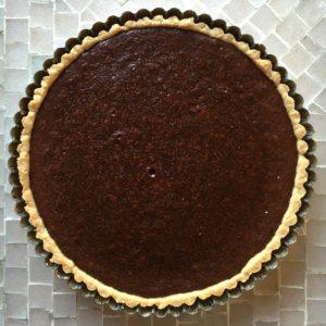 Chocolate Tart with Tea-Candied Pink Lemons