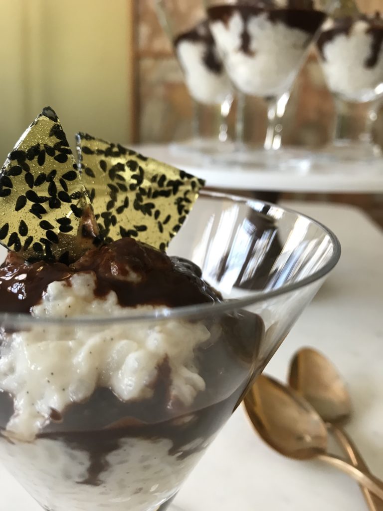 Rice Pudding with Chocolate-Tahini Sauce and Black Sesame Praline