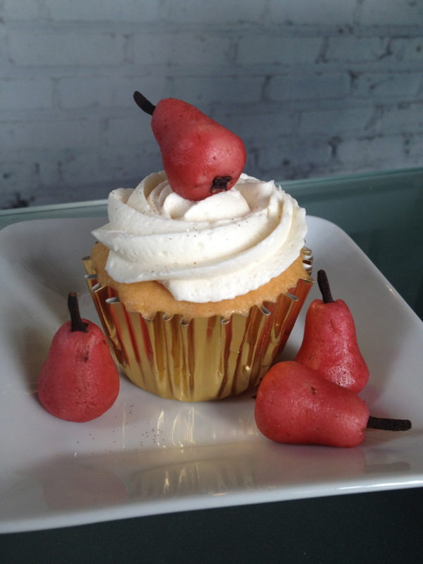 almond cake with marzipan pears and vanilla buttercream